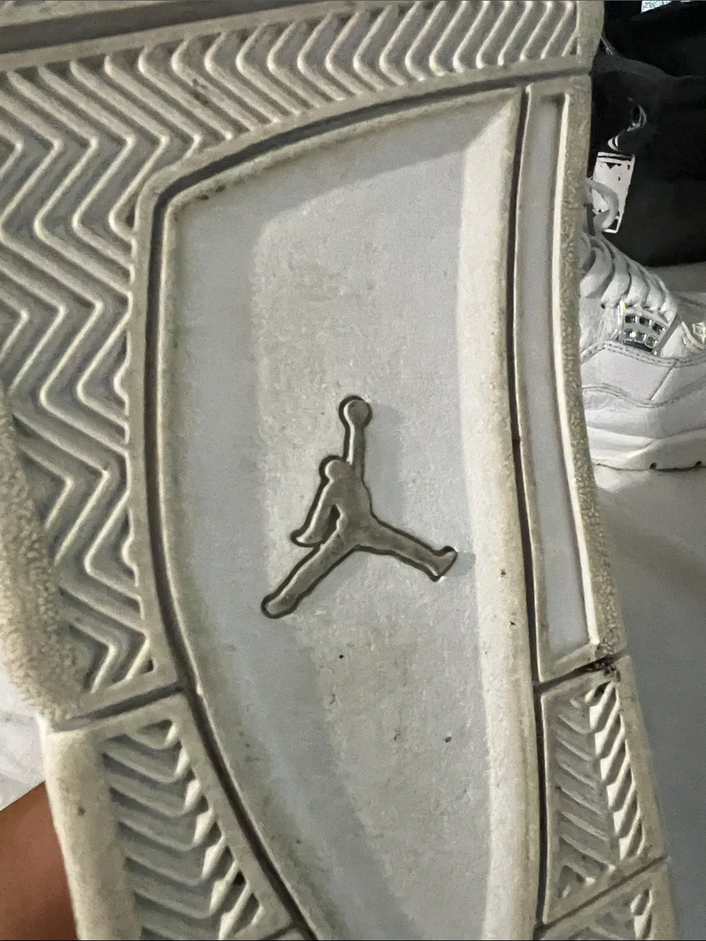 Air Jordan 4 Retro White Leather Sneakers